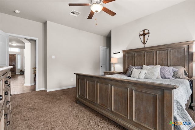 carpeted bedroom featuring ceiling fan