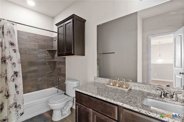 full bathroom featuring shower / bath combo, tile patterned flooring, vanity, and toilet