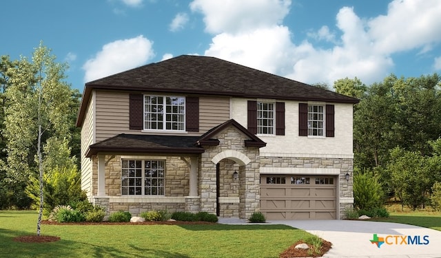 view of front facade with a garage and a front lawn