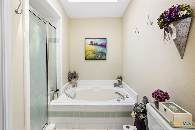 216 Ridge Dr, Victoria, TX 77904 - bathroom featuring a garden tub and a stall shower