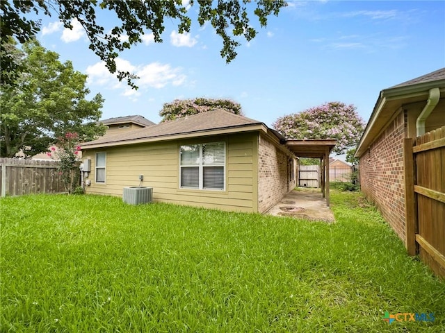 908 Pennsylvania Ave, Victoria, TX 77904 - rear view of house featuring a fenced backyard and brick siding