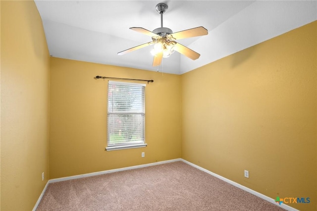 908 Pennsylvania Ave, Victoria, TX 77904 - carpeted spare room featuring a ceiling fan and baseboards
