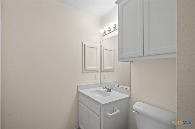 908 Pennsylvania Ave, Victoria, TX 77904 - bathroom featuring vanity and toilet