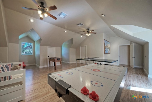 3701 Del Robles Dr, Austin, TX 78727 - recreation room featuring ceiling fan, vaulted ceiling, light wood finished floors, and visible vents