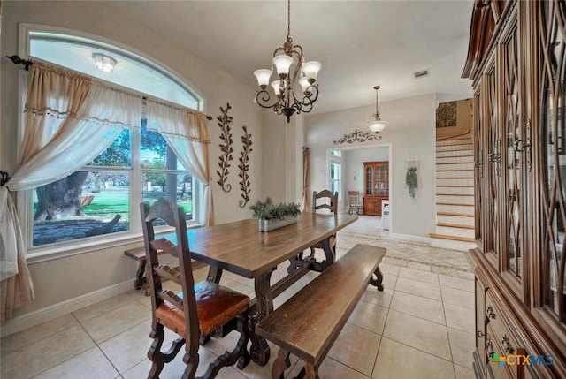 3701 Del Robles Dr, Austin, TX 78727 - dining room with light tile patterned floors, a healthy amount of sunlight, and visible vents
