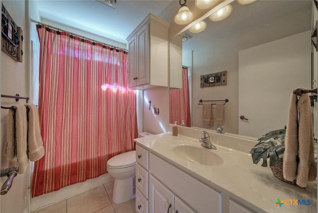 3701 Del Robles Dr, Austin, TX 78727 - full bath with vanity, tile patterned flooring, and toilet