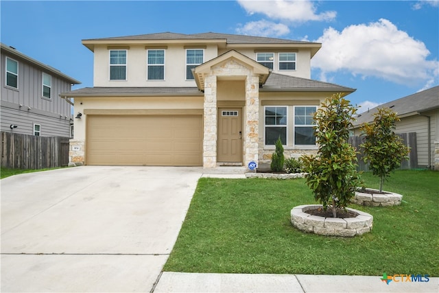 104 Hannah Trl, Georgetown, TX 78628 - view of front of home with stucco siding, driveway, and an attached garage