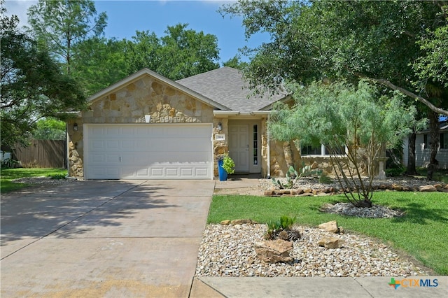 ranch-style house featuring a garage