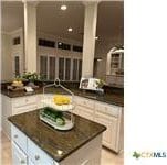 kitchen featuring dark countertops and a kitchen island