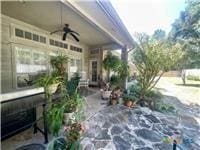 view of patio featuring a ceiling fan