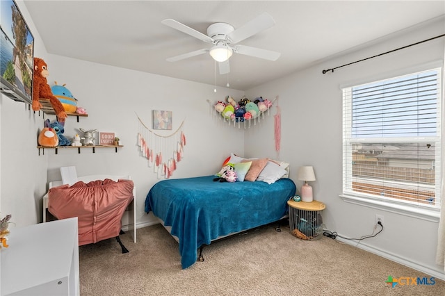 bedroom featuring carpet and a ceiling fan