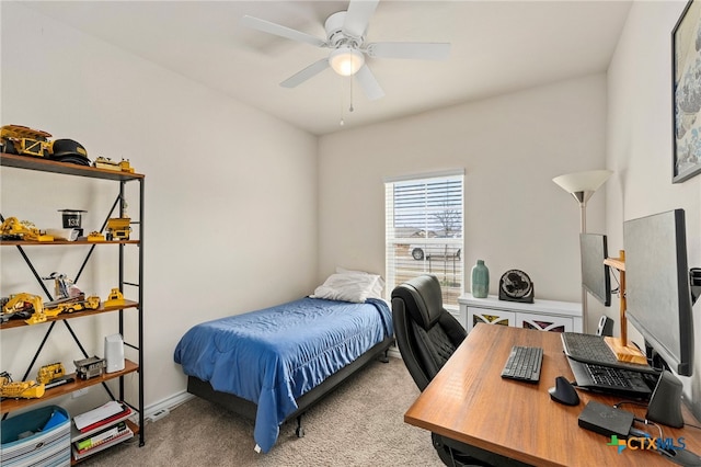 bedroom featuring carpet floors, baseboards, and a ceiling fan