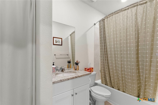 full bathroom featuring vanity, toilet, and shower / bath combo with shower curtain