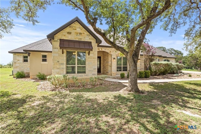 2718 Beaver Ln, New Braunfels, TX 78132 - view of front of property with stone siding, roof with shingles, and a front yard