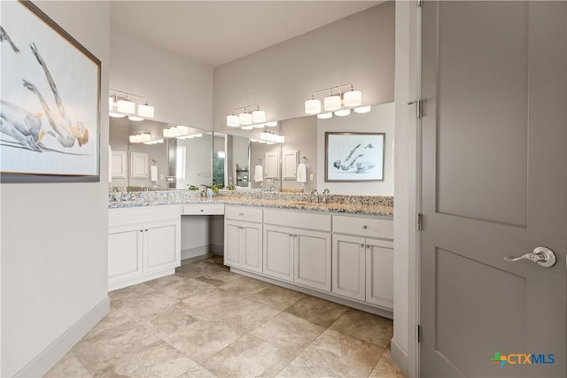 2718 Beaver Ln, New Braunfels, TX 78132 - full bathroom with baseboards and vanity