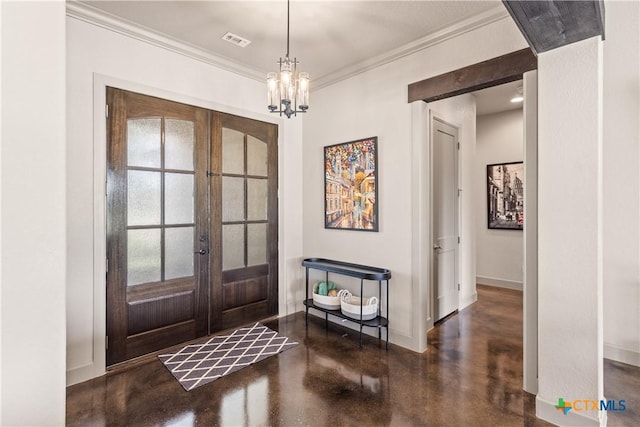 2718 Beaver Ln, New Braunfels, TX 78132 - foyer with french doors, finished concrete flooring, an inviting chandelier, and ornamental molding