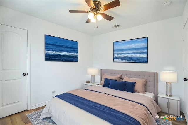 7202 Bose Ikard Dr, Killeen, TX 76549 - bedroom with wood finished floors and a ceiling fan