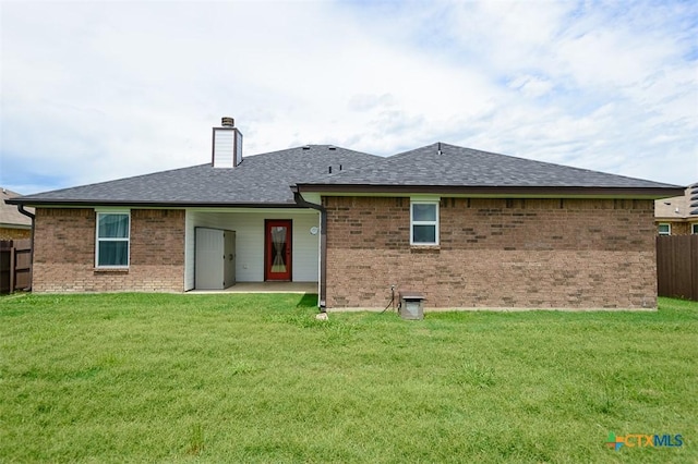 7202 Bose Ikard Dr, Killeen, TX 76549 - rear view of property featuring brick siding, a chimney, a patio, and a shingled roof