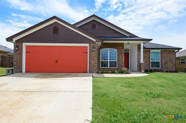 7202 Bose Ikard Dr, Killeen, TX 76549 - view of front of house with a garage, driveway, and brick siding