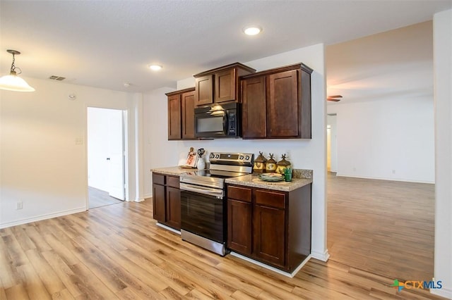 7202 Bose Ikard Dr, Killeen, TX 76549 - kitchen featuring black microwave, stainless steel range with electric stovetop, light wood-style floors, dark brown cabinets, and recessed lighting