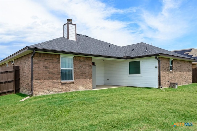 7202 Bose Ikard Dr, Killeen, TX 76549 - rear view of property with a chimney, roof with shingles, brick siding, and a patio
