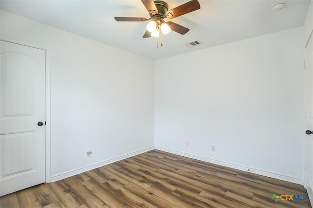 7202 Bose Ikard Dr, Killeen, TX 76549 - empty room with wood finished floors, a ceiling fan, and a smoke detector