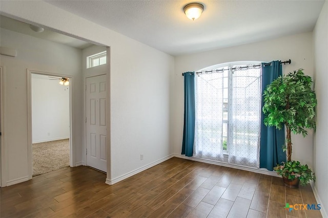 7202 Bose Ikard Dr, Killeen, TX 76549 - spare room featuring dark wood-style flooring and a ceiling fan