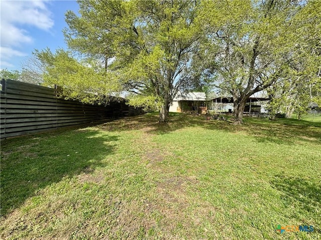view of yard with fence