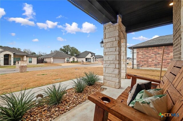 view of patio / terrace featuring a residential view