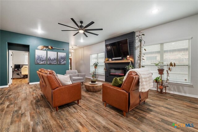 bedroom featuring ceiling fan, baseboards, and carpet flooring