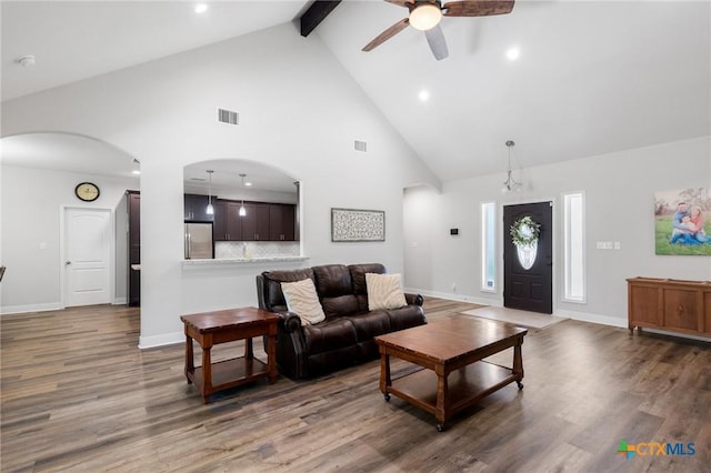 267 Oak View Dr, Inez, TX 77968 - living area with high vaulted ceiling, ceiling fan, beam ceiling, arched walkways, and wood finished floors