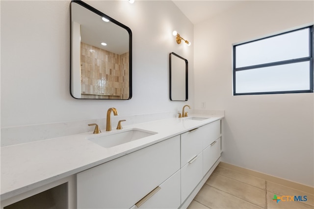 bathroom with vanity and tile patterned floors