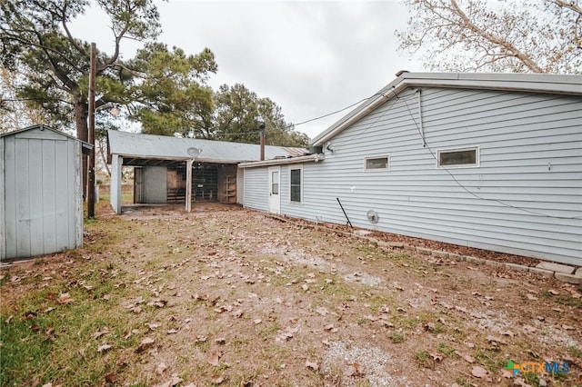 back of property with a shed