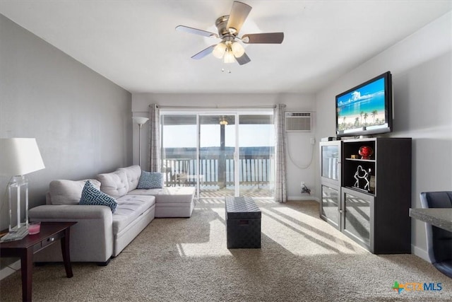 carpeted living room featuring a wall mounted air conditioner and ceiling fan