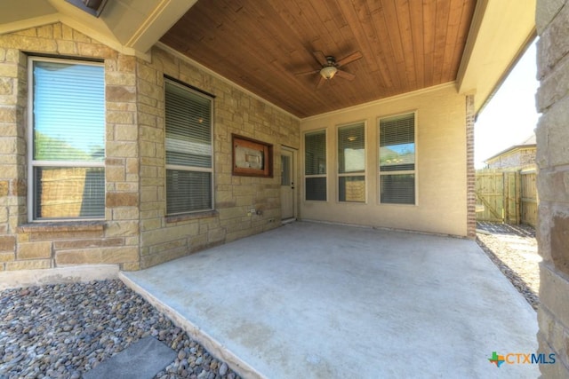 view of patio / terrace featuring ceiling fan