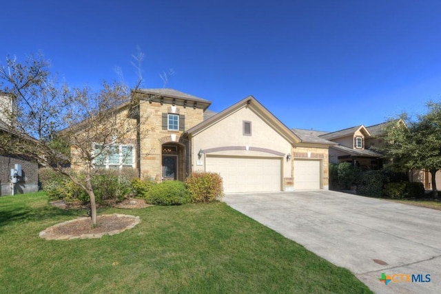 view of front of property with a front lawn and a garage