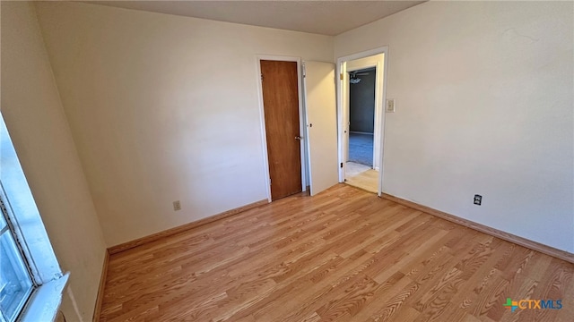 empty room with light wood-type flooring