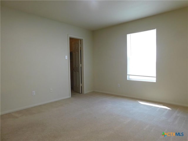 2302 Napier Dr, Killeen, TX 76542 - empty room featuring light carpet and baseboards