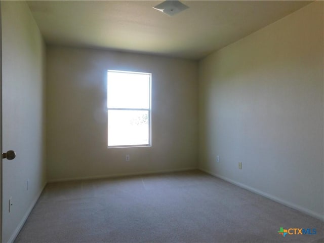 2302 Napier Dr, Killeen, TX 76542 - unfurnished room featuring light carpet and baseboards