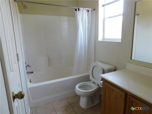2302 Napier Dr, Killeen, TX 76542 - bathroom with toilet, vanity, shower / bath combo with shower curtain, and tile patterned floors