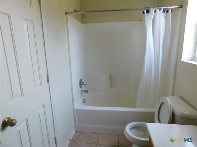 2302 Napier Dr, Killeen, TX 76542 - bathroom with toilet, shower / bath combo with shower curtain, vanity, and tile patterned flooring