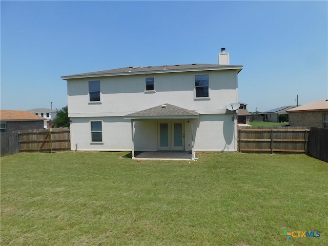 2302 Napier Dr, Killeen, TX 76542 - back of property featuring a chimney, a patio, roof with shingles, and stucco siding
