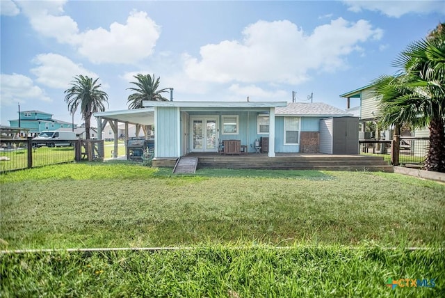 819 S Magnolia St, Rockport, TX 78382 - back of house with french doors