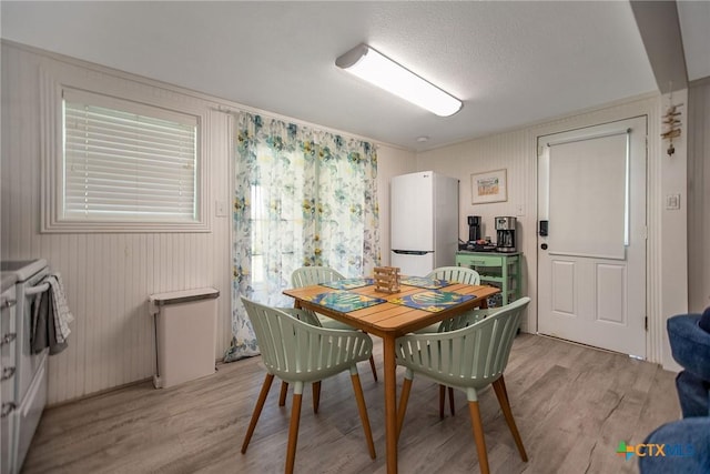 819 S Magnolia St, Rockport, TX 78382 - dining room featuring light wood-type flooring