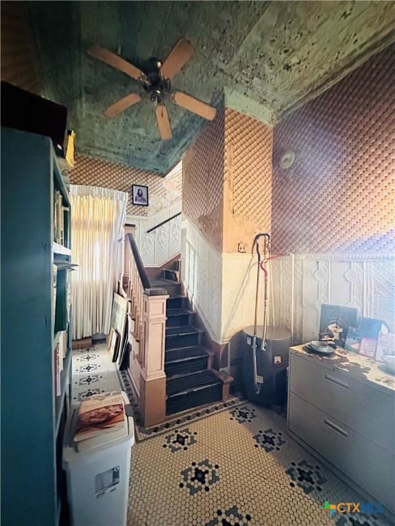 kitchen featuring ceiling fan and tile patterned floors