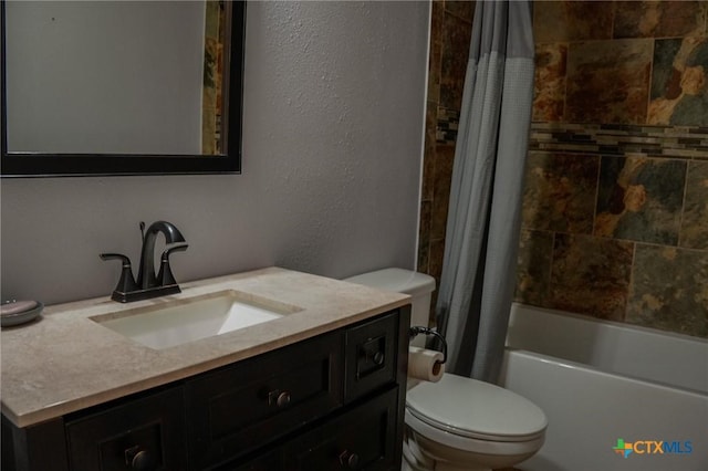 22631 John Rolfe Ln, Katy, TX 77449 - full bathroom featuring vanity, shower / tub combo, and a textured wall