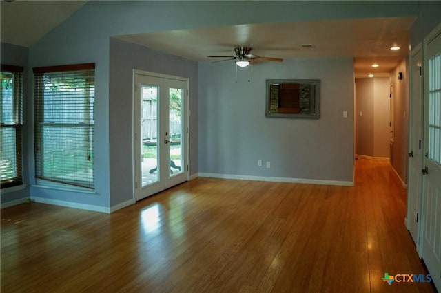 22631 John Rolfe Ln, Katy, TX 77449 - unfurnished room featuring french doors, wood finished floors, and a ceiling fan