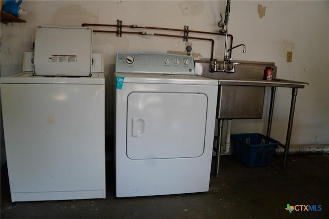 22631 John Rolfe Ln, Katy, TX 77449 - washroom featuring washer and clothes dryer