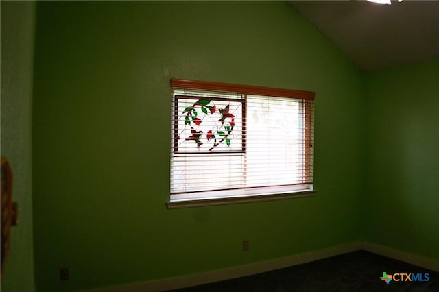 22631 John Rolfe Ln, Katy, TX 77449 - unfurnished room featuring lofted ceiling and baseboards