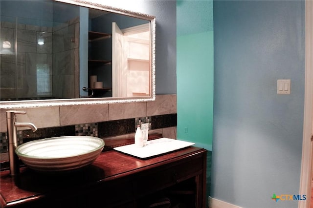 22631 John Rolfe Ln, Katy, TX 77449 - full bath featuring decorative backsplash, double vanity, and tiled shower